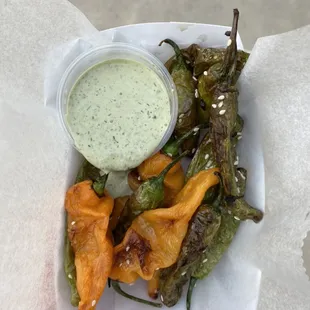 This is a seasonal item with produce from Heirloom acres. Fried Shishitos and Habanadas with house made green goddess dressing