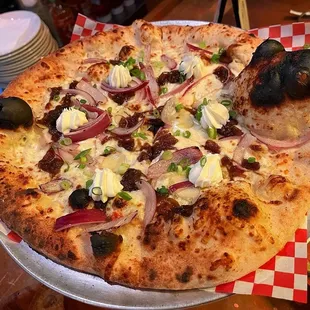 Look at that bubble! Tre Cipolle (aged mozzarella, garlic, caramelized onions, red onions, ricotta &amp; scallions)