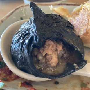Inside of a truffle soup dumpling.