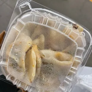 a plastic container filled with food