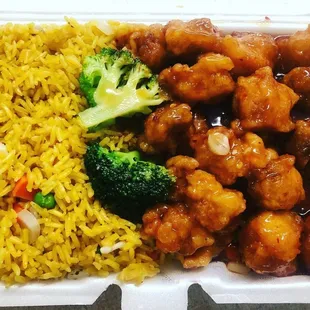 chicken and rice in a styrofoam container