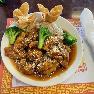 Sesame Chicken w/ fried rice and crab Rangoon.