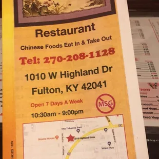a hand holding a menu for a chinese restaurant