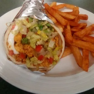 Chicken Shawarma sandwich with fries at King Grill. Good Mediterranean food at a reasonable price. Big portions.