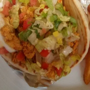 King Grill&apos;s Chicken Shawarma in Pita with fries. Lots of chicken, a bit spicy with fresh veggies. Very good at a good price.