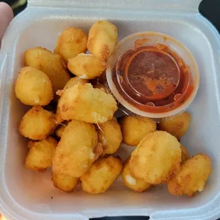 Cheese curds. Crispy and not greasy like this kind of cheese curd typically is.