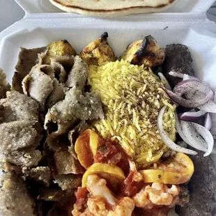 Chicken kabob, ground beef and gyro combination plate