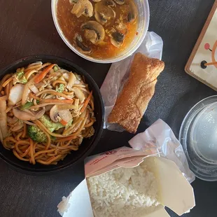 Delicious and savory! Vegetable lo mein, hot n sour soup, rice, shrimp eggroll