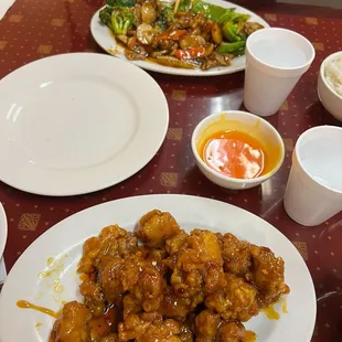 Governor's Chicken in the front, Beef + Veggies in the back, the empty plate was Cream Cheese Wontons -- also Highly recommended!!