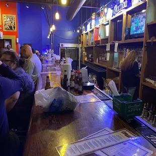 patrons at the bar