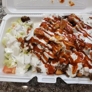 Mixed platter with chicken, lamb &amp; white sauce...i added the hot sauce $9