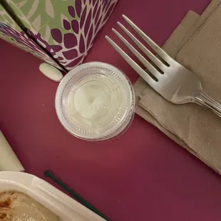 Tiny garlic sauce-u can tell because it's smaller than a regular fork!
