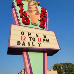 a neon sign for an ice cream parlor