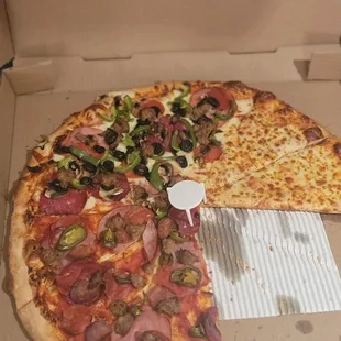 XL pizza: one.side cheese, other side meat lovers with jalapeños and NO cheese, and other side combination