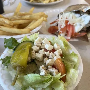 Small Greek salad (I picked off the Greek olives) side of fries (best fries ever!) and gyro.