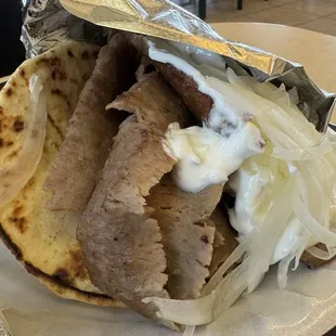 Gyro sandwich no tomatoes.