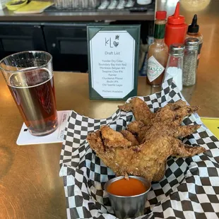 Wings w/ Buffalo sauce. Boundary Bay Red Irish Ale. Draft Beer Menu.