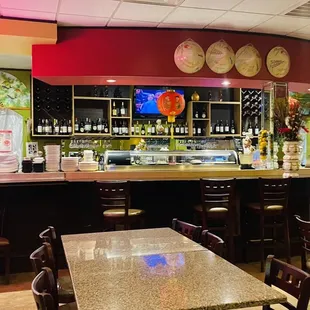 a view of the bar and dining area