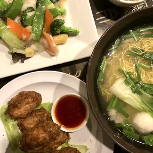 60. Seafood w/ Vegetables   14. Deep-fried Chicken Wings Egg Noodle soup with fish ball, chives and bokchoy.