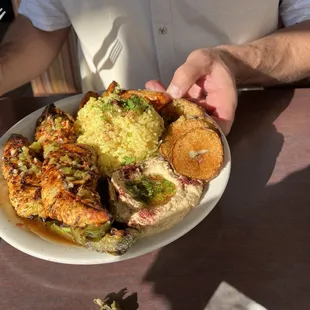 Chicken Tika with rice and hummus.