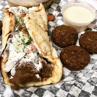 Gyros Sandwich with a side of falafel.