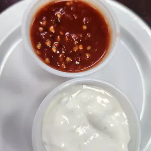 Spicy sauce and tzatziki