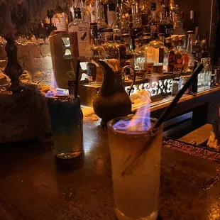 Two flaming cocktails