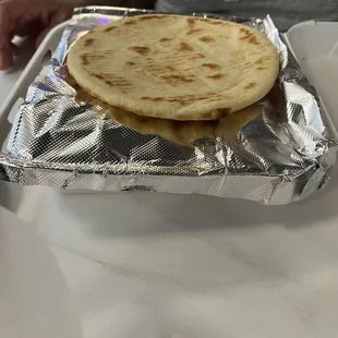 This is how the plate is packed...we loved the way the foil made a resting place for the warmed pita