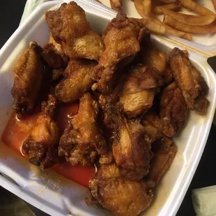 These are suppose to be buffalo wings. There was no sauce on top and the liquid on the bottom is essentially oil.