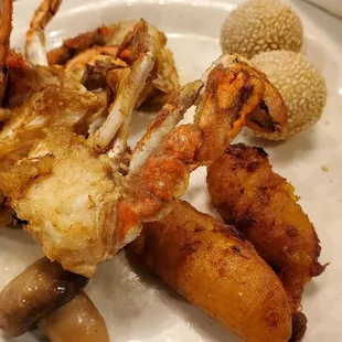 Fried crab, sauteed mushroom, fried caramelized banana, and sesame balls.