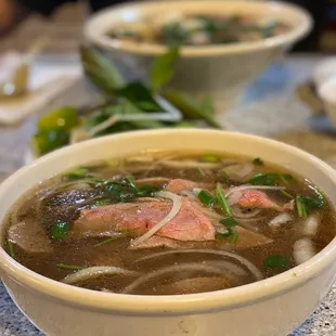 65. Pho Chay (in the back) &amp; Pho w/ Beef Strips, Meatballs, Tripe, &amp; Tendon