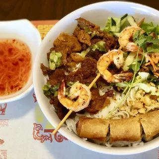 Grilled Pork, Shrimp Skewers and Eggrolls with Steamed Rice