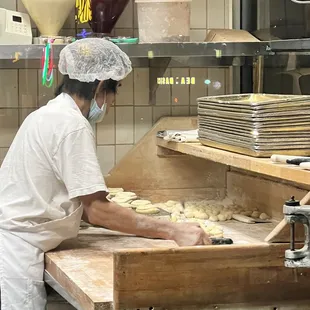 a baker making dough