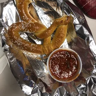 Tempting pretzel with pizza sauce