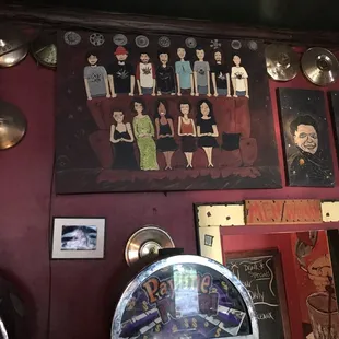 a group of people on a wall