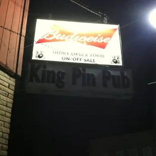 a sign for king pin pub