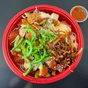 a bowl of noodles and vegetables