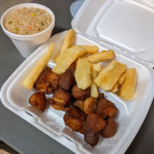 Yuca con chicharron and a side of fried rice