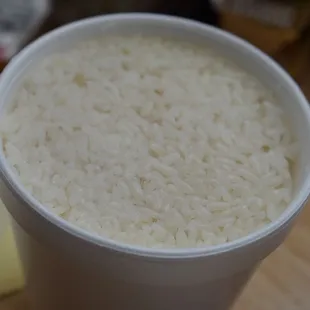 two cups of rice on a table
