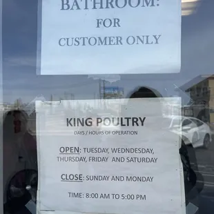 a sign in the window of a restaurant