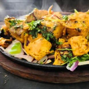 Experience the magic of Indian cuisine with King Restaurant Indian Kitchen and Bar!