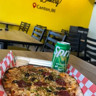 Pizza with pepperoni and olives