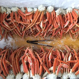 crab legs and crab legs on a cutting board