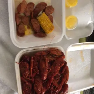 2 pounds of crawfish , corn and spicy sausage