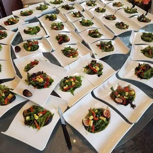 a table full of plates of food