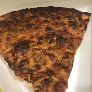 a slice of pizza in a box