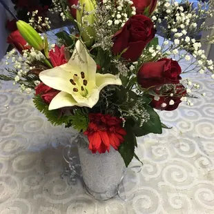 a vase of flowers on a table