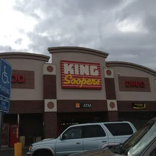 cars parked in front of a store
