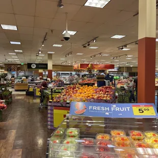 a fresh fruit section in a grocery store