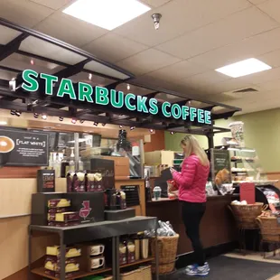 a starbucks coffee shop in a mall